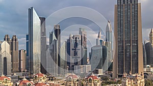 Aerial view on downtown and financial district in Dubai timelapse, United Arab Emirates with skyscrapers and highways.