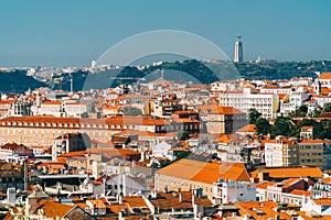 Aerial View Of Downtown Lisbon Skyline Of The Old Historical City And Cristo Rei Santuario Sanctuary Of Christ the King Statue