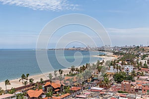 Aerial view of downtown Luanda, marine coast and beach, marginal and central buildings, in Angola