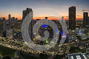 Aerial view of downtown office district of of Miami Brickell in Florida, USA at night. High commercial and residential