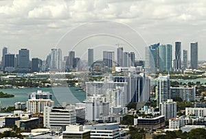 Aerial view of downtown office district of Miami in Florida, USA on bright sunny day. High commercial and residential