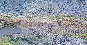 Aerial view with dozen of stones on Giants Causeway, the famous landmark on Northern Ireland UK