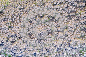 Aerial view with dozen of stones on Giants Causeway, the famous landmark on Northern Ireland UK