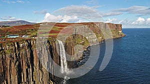 Aerial view of the dramatic coastline at the cliffs by Staffin with the famous Kilt Rock waterfall - Isle of Skye -