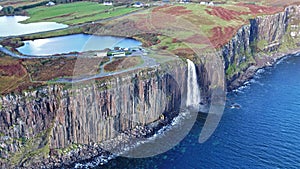 Aerial view of the dramatic coastline at the cliffs by Staffin with the famous Kilt Rock waterfall - Isle of Skye -