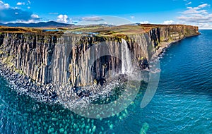 Aerial view of the dramatic coastline at the cliffs by Staffin with the famous Kilt Rock waterfall - Isle of Skye -