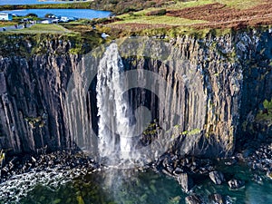 Aerial view of the dramatic coastline at the cliffs by Staffin with the famous Kilt Rock waterfall - Isle of Skye -