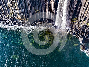 Aerial view of the dramatic coastline at the cliffs by Staffin with the famous Kilt Rock waterfall - Isle of Skye -