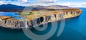 Aerial view of the dramatic coastline at the cliffs by Staffin with the famous Kilt Rock waterfall - Isle of Skye -