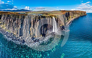 Aerial view of the dramatic coastline at the cliffs by Staffin with the famous Kilt Rock waterfall - Isle of Skye - photo