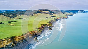 Aerial view on a dramatic Tasman coast line with cliffs and rocks near New Plymouth. Taranaki region, New Zealand.