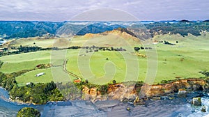 Aerial view on a dramatic Tasman coast line with cliffs and rocks near New Plymouth. Taranaki region, New Zealand.