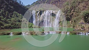 Aerial view drone flight above Jiulong waterfall in Luoping, Yunnan, China