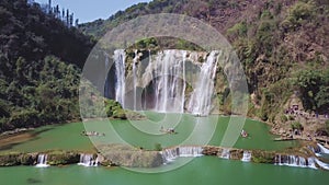 Aerial view drone flight above Jiulong waterfall in Luoping, Yunnan, China