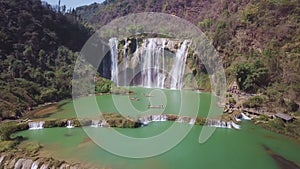 Aerial view drone flight above Jiulong waterfall in Luoping, Yunnan, China