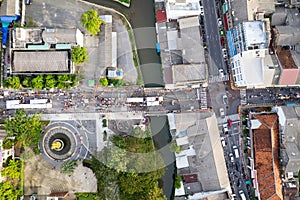Aerial view Drone flying over phuket city Thailand.Drone over a street night market in Sunday at Phuket Town and Tourists walking
