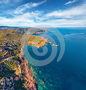 Aerial view from drone of Li Cossi seashore. Colorful spring scene of Costa Paradiso, Sardinia island, Italy,