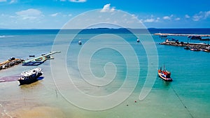 Aerial view from drone of Long tail pier in summer, Industrial cargo port under blue sky