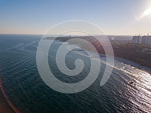 Aerial view from drone marine cityscape of town Odesa, Ukraine on a background of clear blue sky in a sunny day. Copy