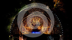 aerial view with drone of people watching concert in open air theater