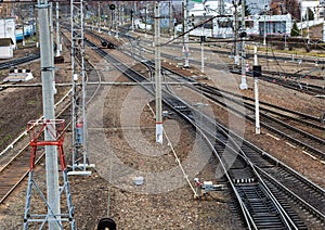 Aerial view from drone on railroad tracks next to the train platform