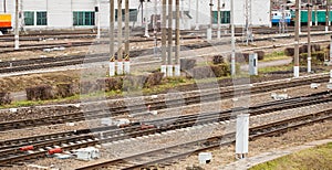 Aerial view from drone on railroad tracks next to the train platform