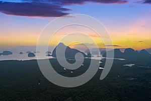 Aerial view drone shot of beautiful sunrise sky in the morning sunrise over sea and mangrove forest Landscape High angle view