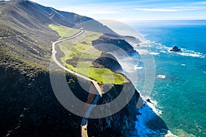 Aerial View Drone Shot of Highway Pacific Coast Highway California USA Big Sur Mountains Ocean Fog Sun