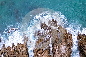Aerial View Drone shot of waves crashing on seashore, Sea ocean background