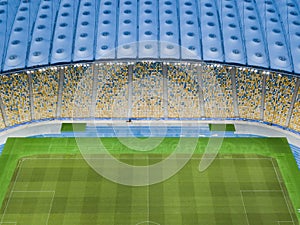 Aerial view from the drone to the football stadium NSC Olimpiysky with the blue-yellow stands Kiev, Ukraine