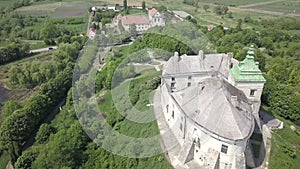 Aerial view from drone to the historic castle and park in Olesko - famous ukrainian sightseeing