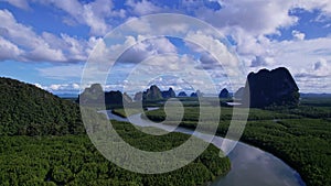 Aerial view Drone view shot of Amazing mountains mangrove forest and sea landscape with shadows clouds over mountains,Located at B