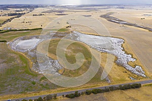 Aerial view of a drought affected agricultural dam in regional Australia