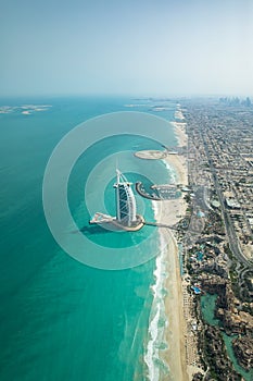 Aerial view of Dubai coast line on a beautiful sunny day.