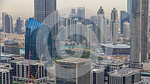 Aerial view of Dubai downtown Lake area timelapse and skyscrapers of Old Town Island, from top. Skyline urban city of