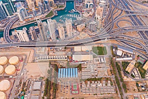 Aerial view of Dubai Downtown skyline, highway roads or street in United Arab Emirates or UAE. Financial district and business