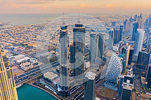 Aerial view of Dubai Downtown skyline, highway roads or street in United Arab Emirates or UAE. Financial district and business