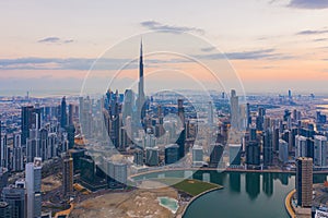 Aerial view of Dubai Downtown skyline, highway roads or street in United Arab Emirates or UAE. Financial district and business