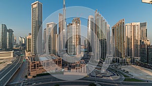 Aerial view of Dubai Downtown skyline with many towers timelapse.