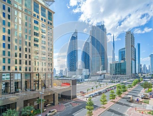 Aerial view of Dubai Downtown skyline with parking in United Arab Emirates or UAE. Financial district and business area in smart