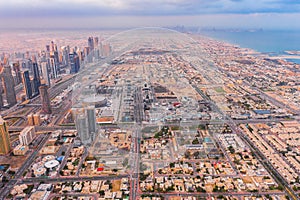 Aerial view of Dubai Downtown skyline, United Arab Emirates or UAE. Financial district and business area in smart urban city.