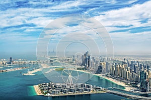 Aerial view of Dubai Marina skyline with Dubai Eye ferris wheel, United Arab Emirates