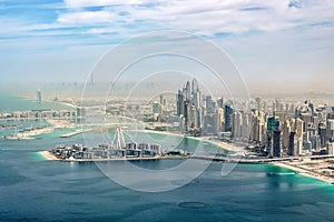 Aerial view of Dubai Marina skyline with Dubai Eye ferris wheel United Arab Emirates