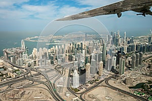 Aerial view of Dubai Marina skyline, road interchange and Palm Jumeirah United Arab Emirates