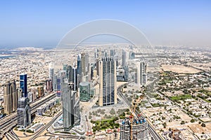 Aerial view of Dubai Skyline, Amazing Rooftop view of Sheikh Zayed Road Residential and Business Skyscrapers in Downtown Dubai, Un