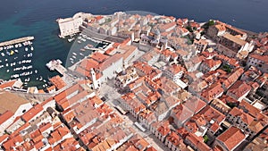 Aerial View of Dubrovnik Old Town Buildings and Harbor on Sunny Summer Day