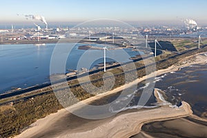 Aerial view Dutch coast with industrial area Maasvlakte photo