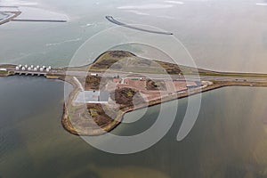 Aerial view Dutch dike Afsluitdijk between IJsselmeer and Wadden Sea
