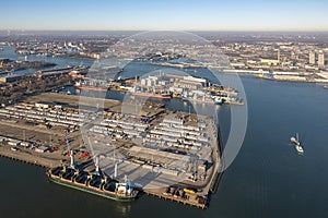 Aerial view Dutch industrial park with harbors and ships