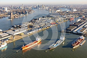 Aerial view Dutch industrial park with harbors and ships